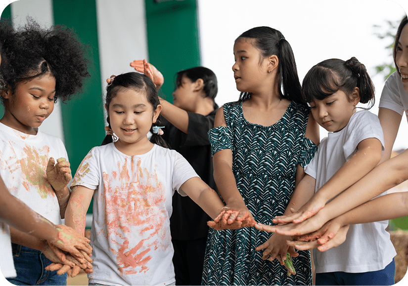 Kids enjoying art activities outside