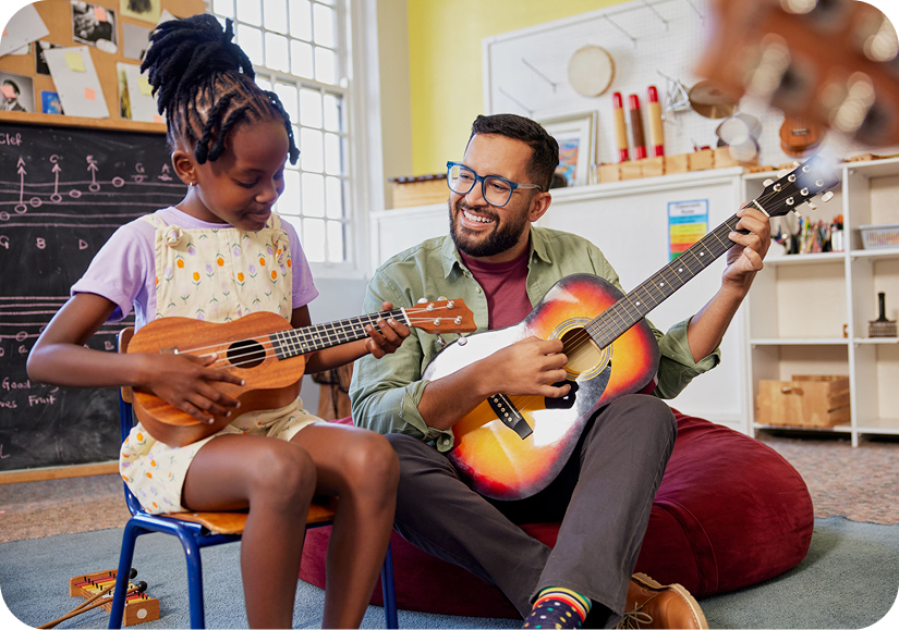 Smiling duo enjoying music session