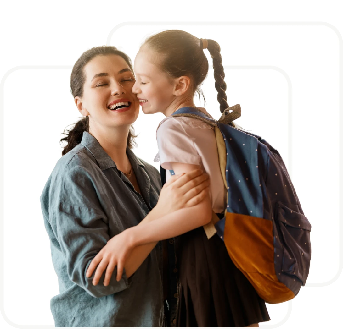 Mother and daughter hugging joyfully