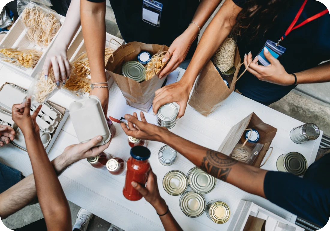 People organizing canned food donations